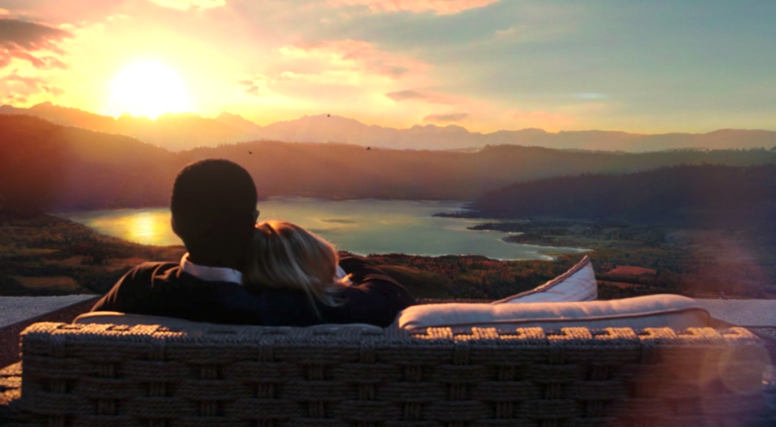 Eleanor and Chidi from The Good Place taking in a beautiful sunset